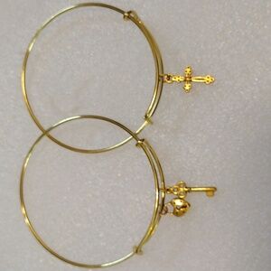 Two beautiful faux gold wire charm bracelets.